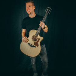 Joel with Guitar | March 2022 Issue - Free Christian Lifestyle Magazine | Nashville Christian Family Magazine