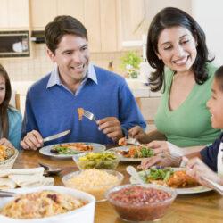 Resolve in 2023 To Eat Together as a Family Dinner - Family enjoying a meal together | Nashville Christian Family Magazine - Free Christian Magazine