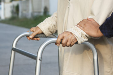 Caring for the Elderly & Your Senior Love Ones - Senior Women using a walker to corss the street | Nashville Christian Family Magazine - Free Christian Magazine