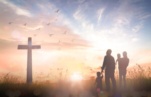 Essence of Worship - Silhouette image of family standing in front of the corss - Easter image | Free Issue of the Nashville Christian Family magazine - Free Christian Magazine
