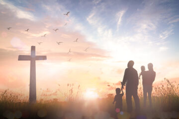 Essence of Worship - Silhouette image of family standing in front of the corss - Easter image | Free Issue of the Nashville Christian Family magazine - Free Christian Magazine