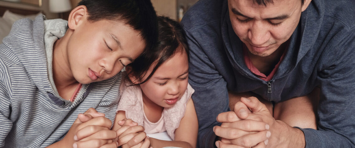 Nashville Christian Family magazine | Free Christian Magazine - Father and his children praying - National Day of Prayer