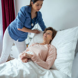 Hospitalization and Dementia: The Role of the Caregiver and Advocate - Home Nurse Making an Elerly Patient comfortable | April 2023 issue \ Nashville Christian Family Magazine