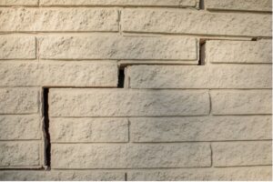 That Small Crack In the Basement Wall, No Problem, Right? - Cracked brick on home | Nashville Christian Family Magazine - June 2023 issue - Free Christian Magazine