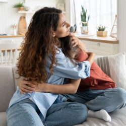 Things Kids of Divorce Wish They Could Say to Their Parents - Caring loving mother comforting hugging sad child | Nashville Christian Family Magazine August 2023 issue - free Christian magazine