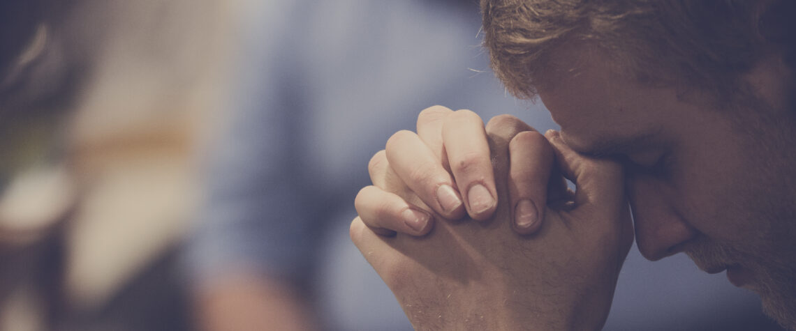 Man praying | Nashville Christian Family Magazine