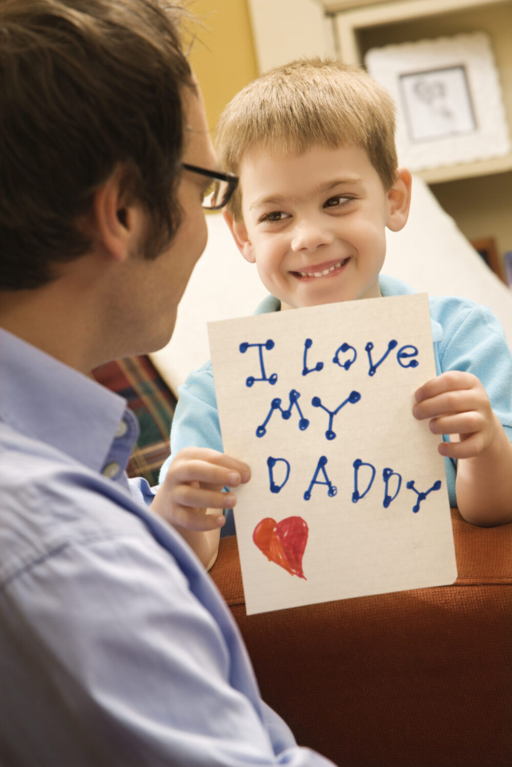 I Love My Daddy - young boy holding handmade card for his father | Nashville Christian Family Magazine