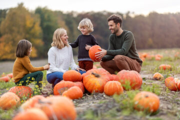 family in a pumpkin patch | Nashville Christian Family Magazine - October 2024 issue