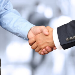 Buy a business - Business handshake | Nashville Christian Family Magazine