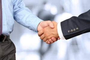 Buy a business - Business handshake | Nashville Christian Family Magazine