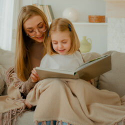 Single Parenting - Mothing and daughter reading | Nashville Christian Family Magazine